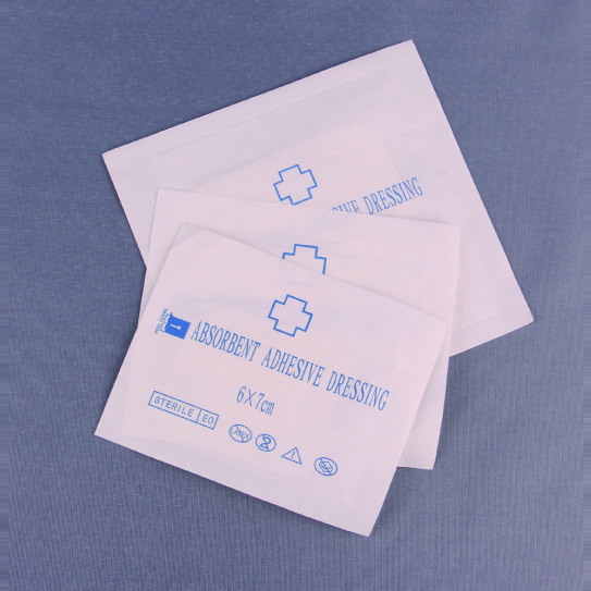 Absorbent adhesive dressing